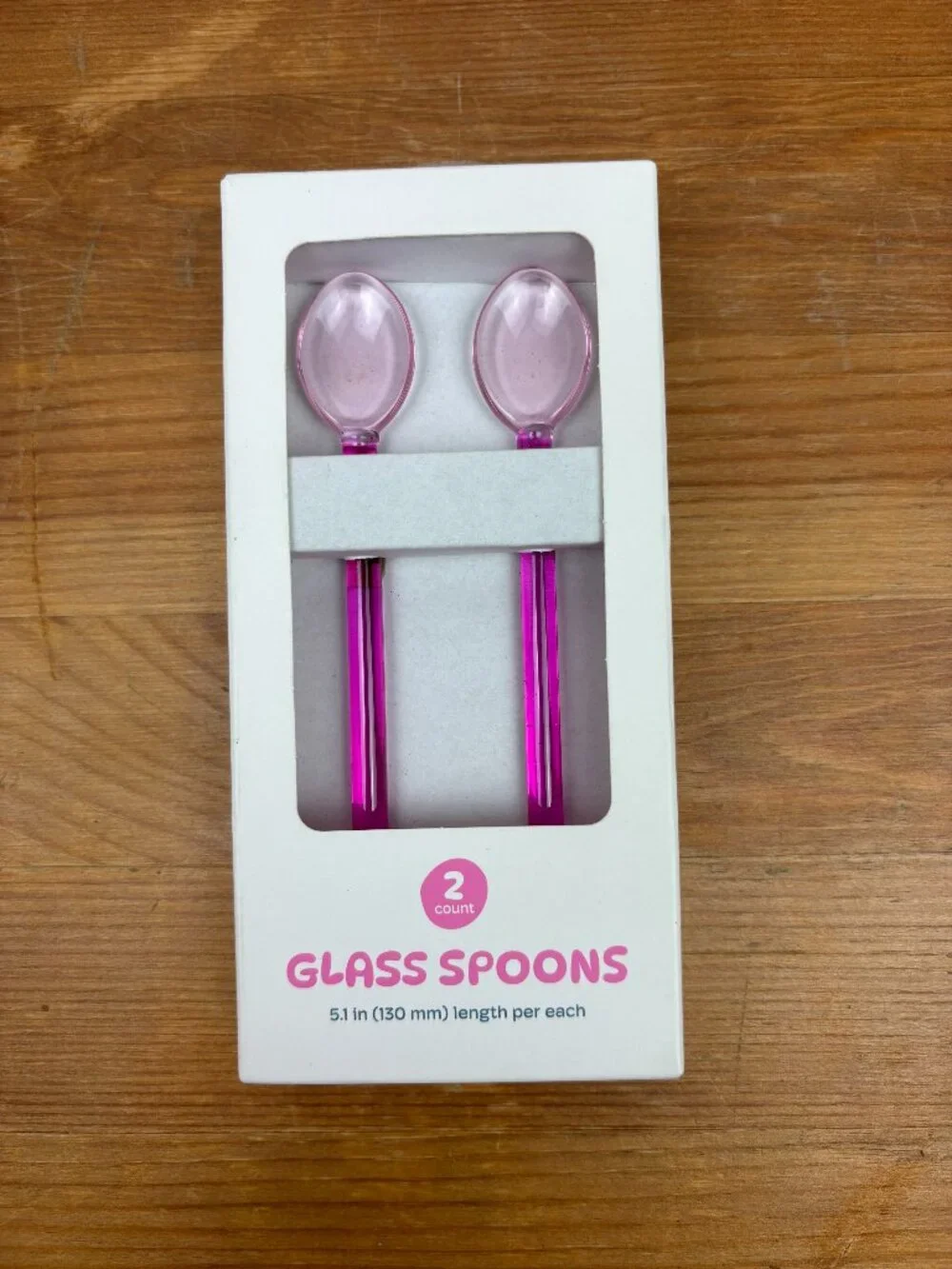 Set of two stylish pink glass spoons for coffee, tea, or cocktails. New